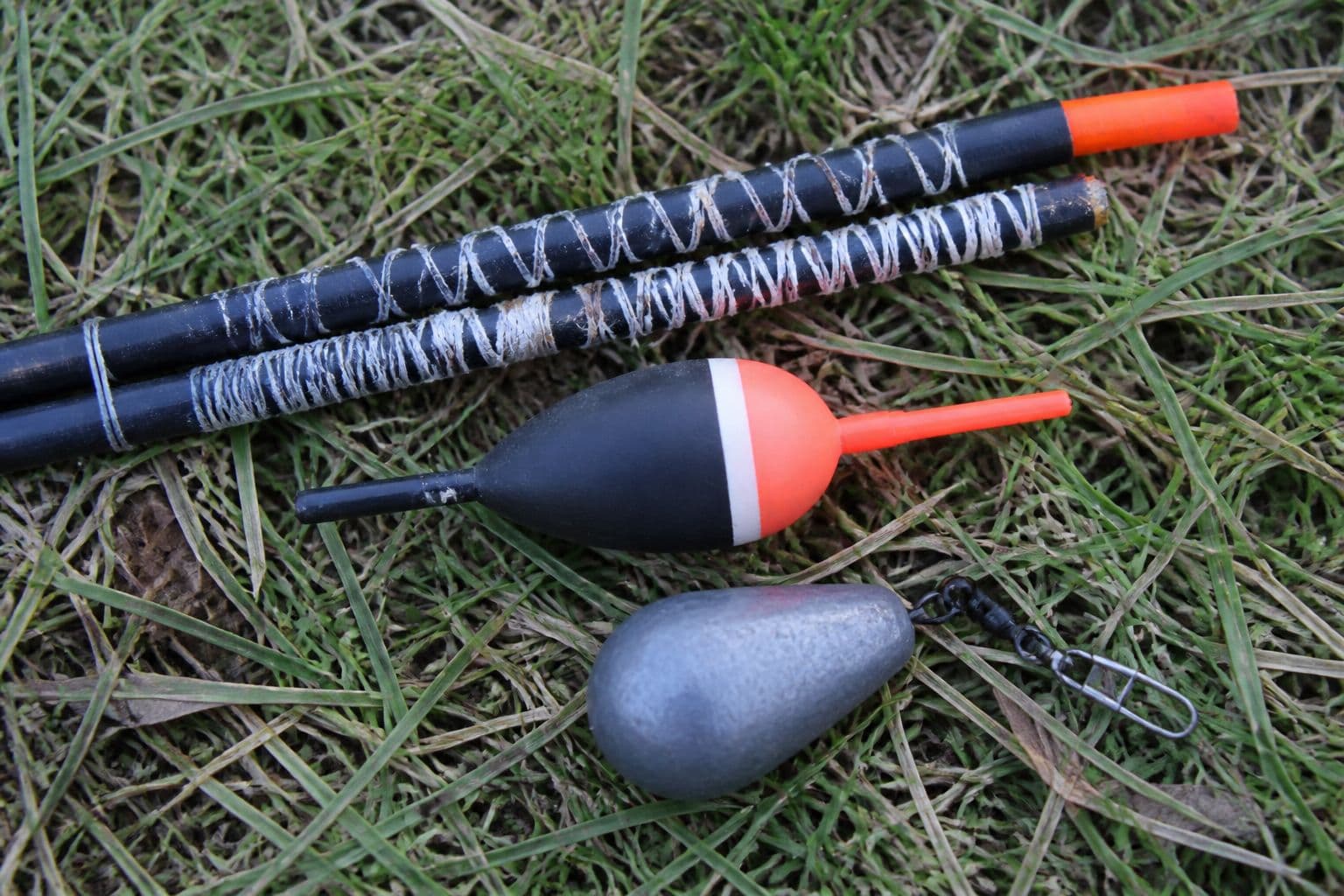 A marker float on the clip, used only when a precise baiting target is worth the extra disturbance